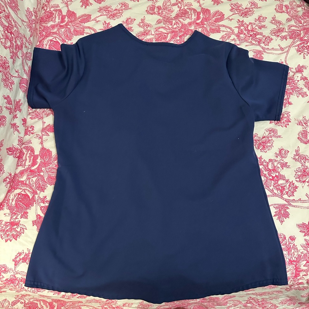 Scrubstar ultimate premium scrub wear! Size small in both top and bottom.